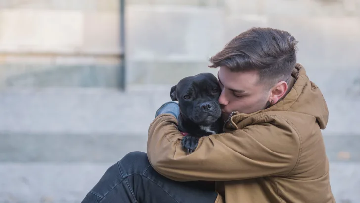 Dog hugs